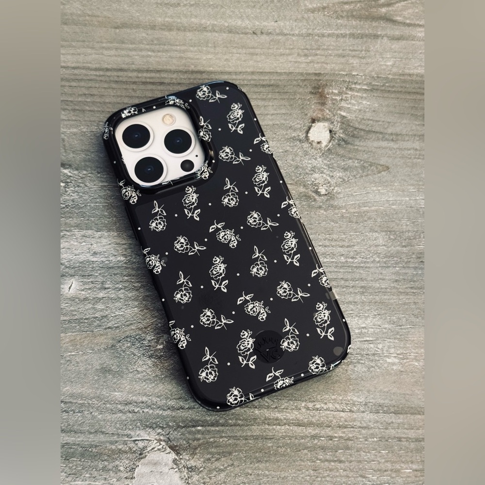 Velvet Caviar black and white rose phone case for iPhone 15